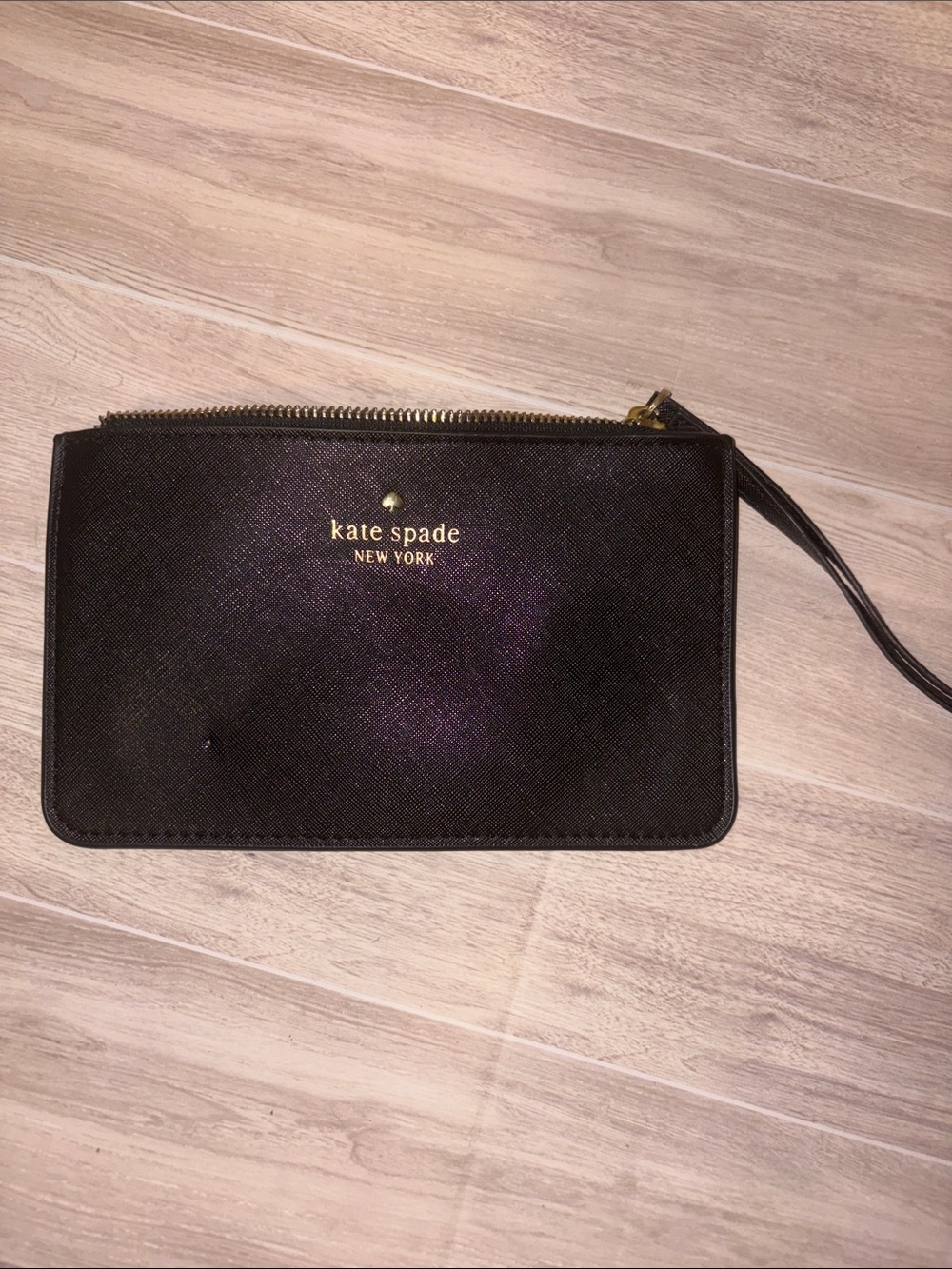 kate spade black saffiano wristlet with gold logo